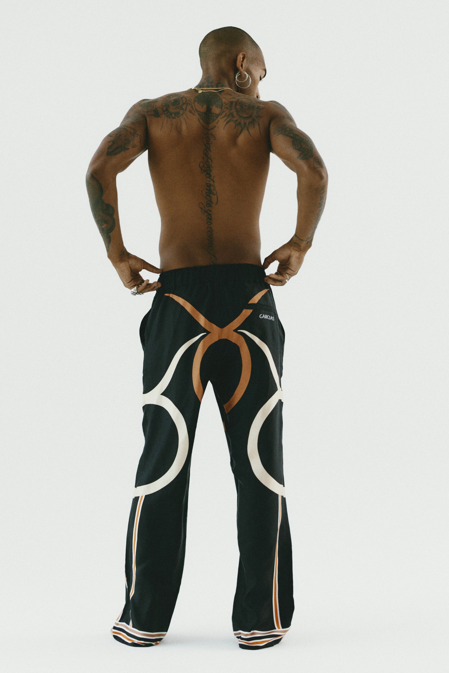 The Bull logo silk trousers